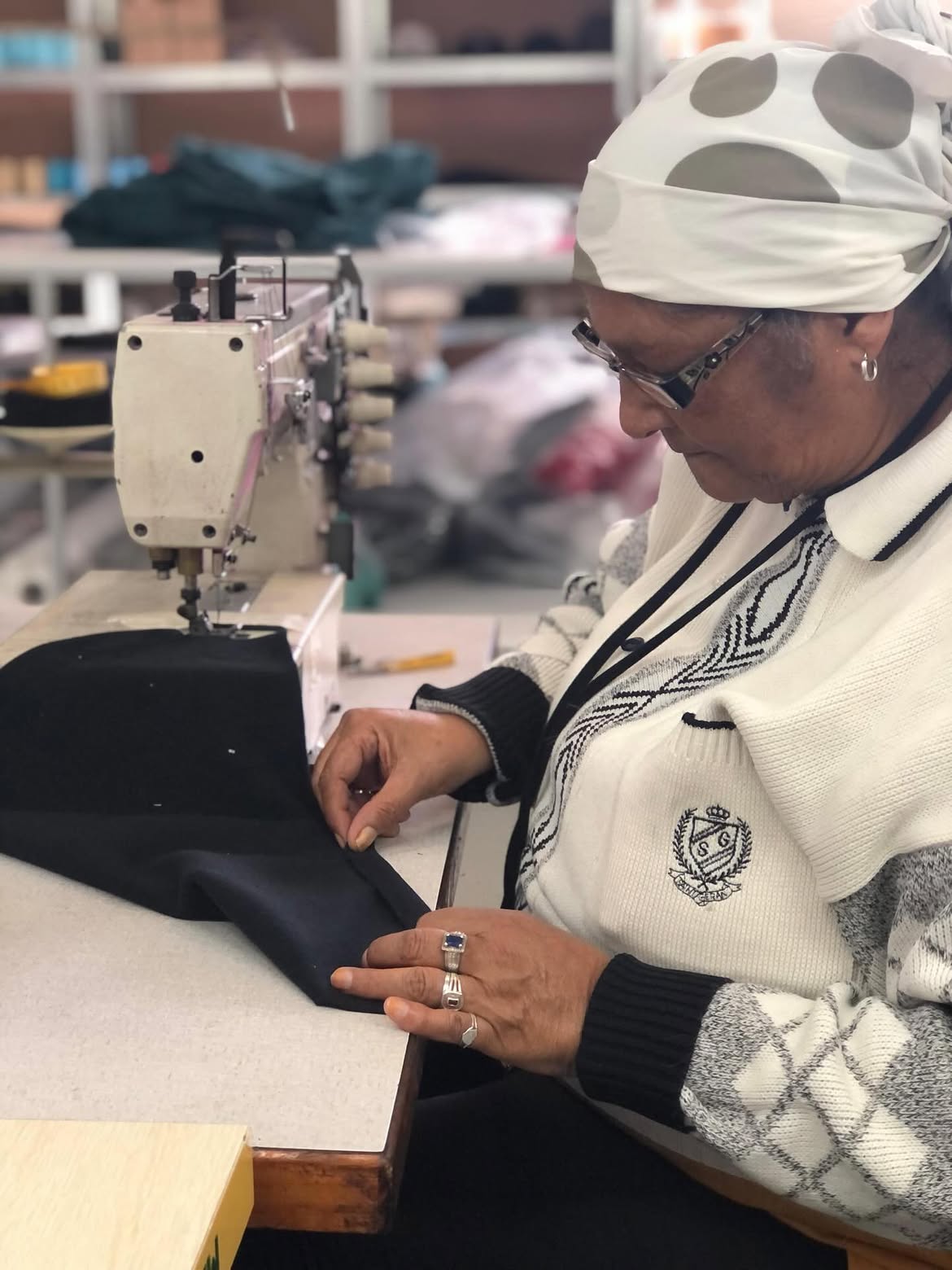A Cape Town seamstress working at a sewing machine